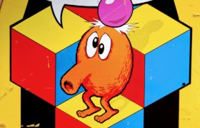 QBert from side of old arcade machine