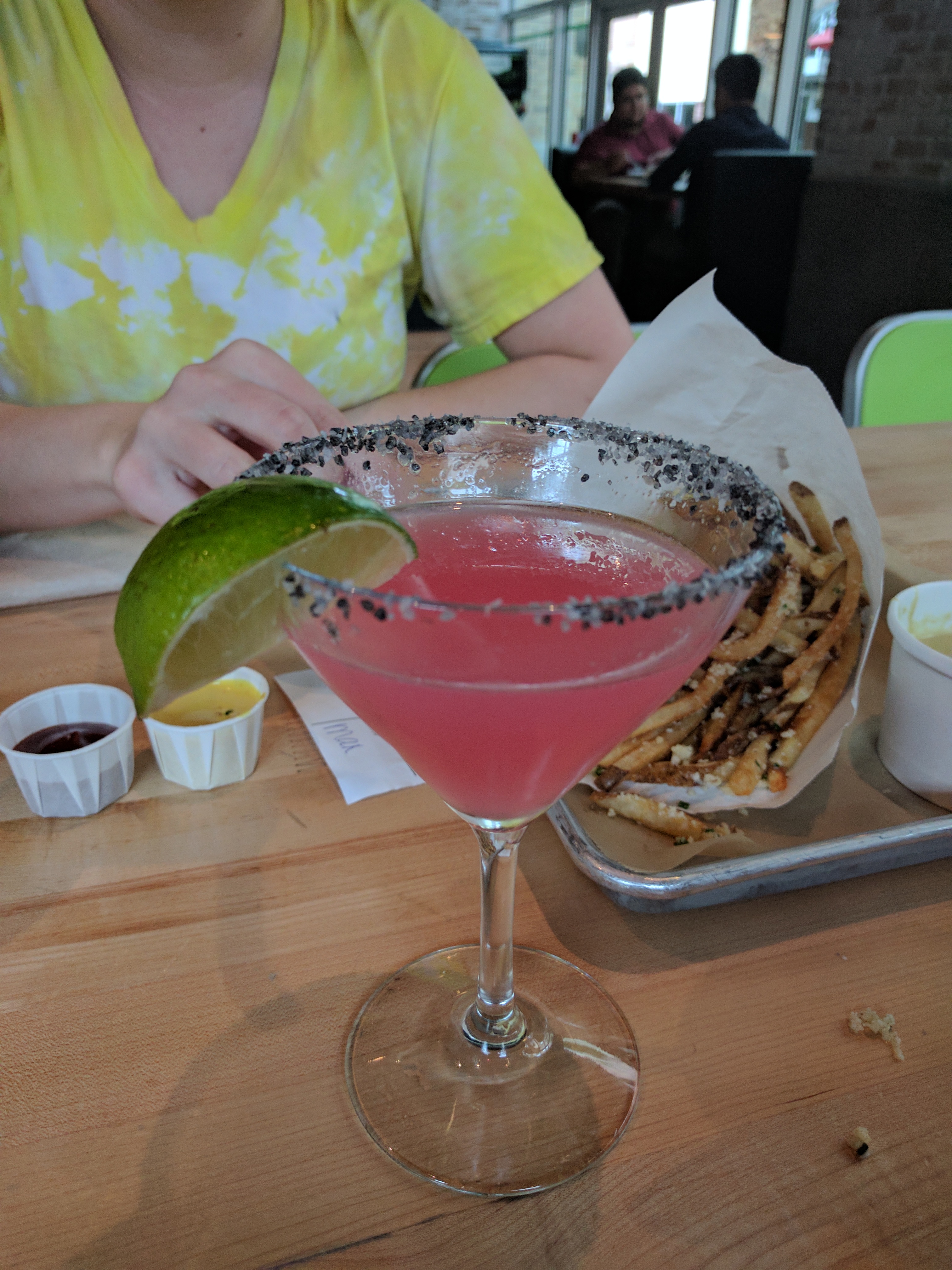 pink drink in a martini glass