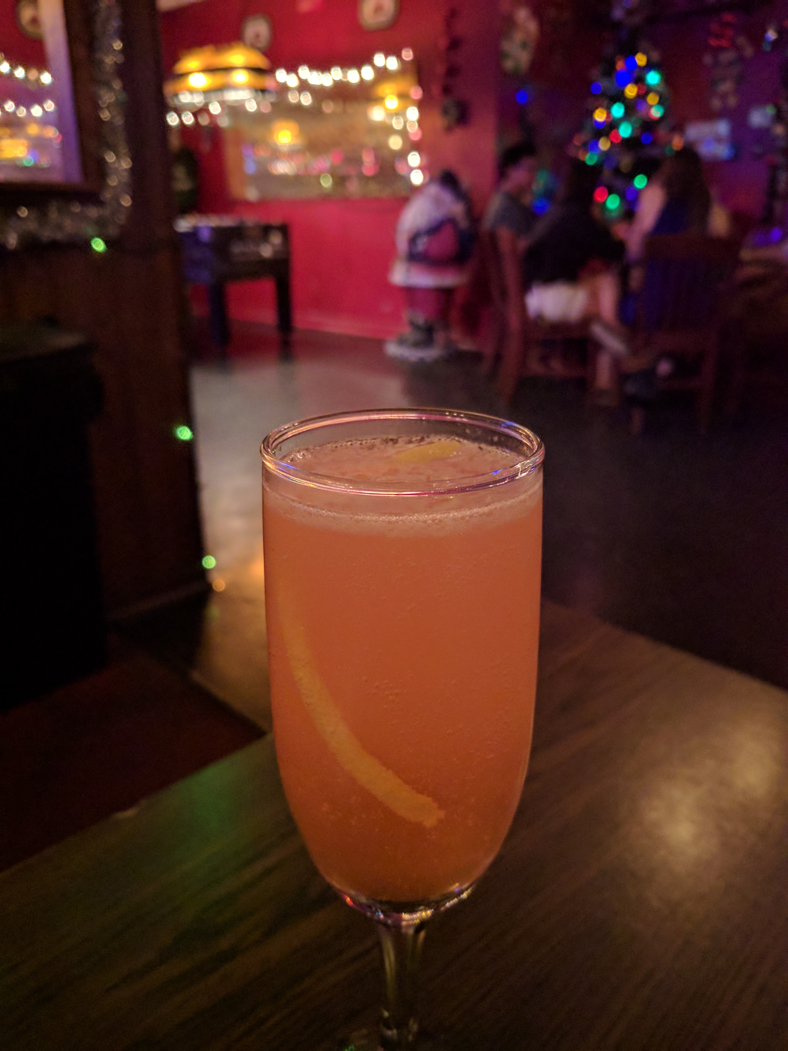 Pink drink in a champagne flute