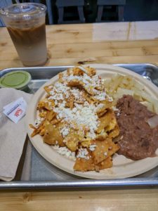 Chilaquiles on a metal tray